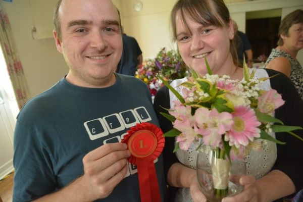 Nicola Burton (pictured with her husband Dave) with her award winning bouquet (Picture by Lewis Clarke)