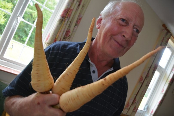 Geoffrey Thomas with his award winning parsnips (Image: Lewis Clarke)